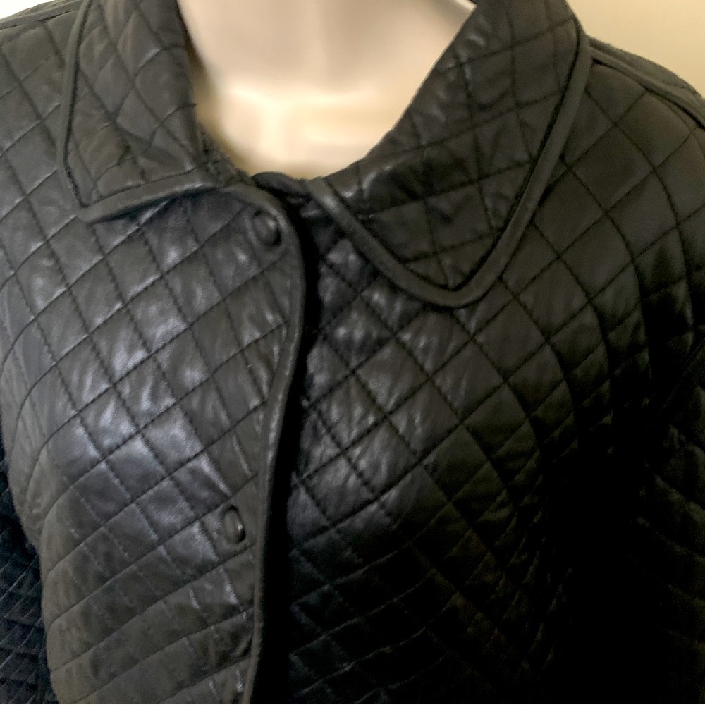 Ladies leather jacket. Quilted black. Very nice and great shape. Has a liner.
